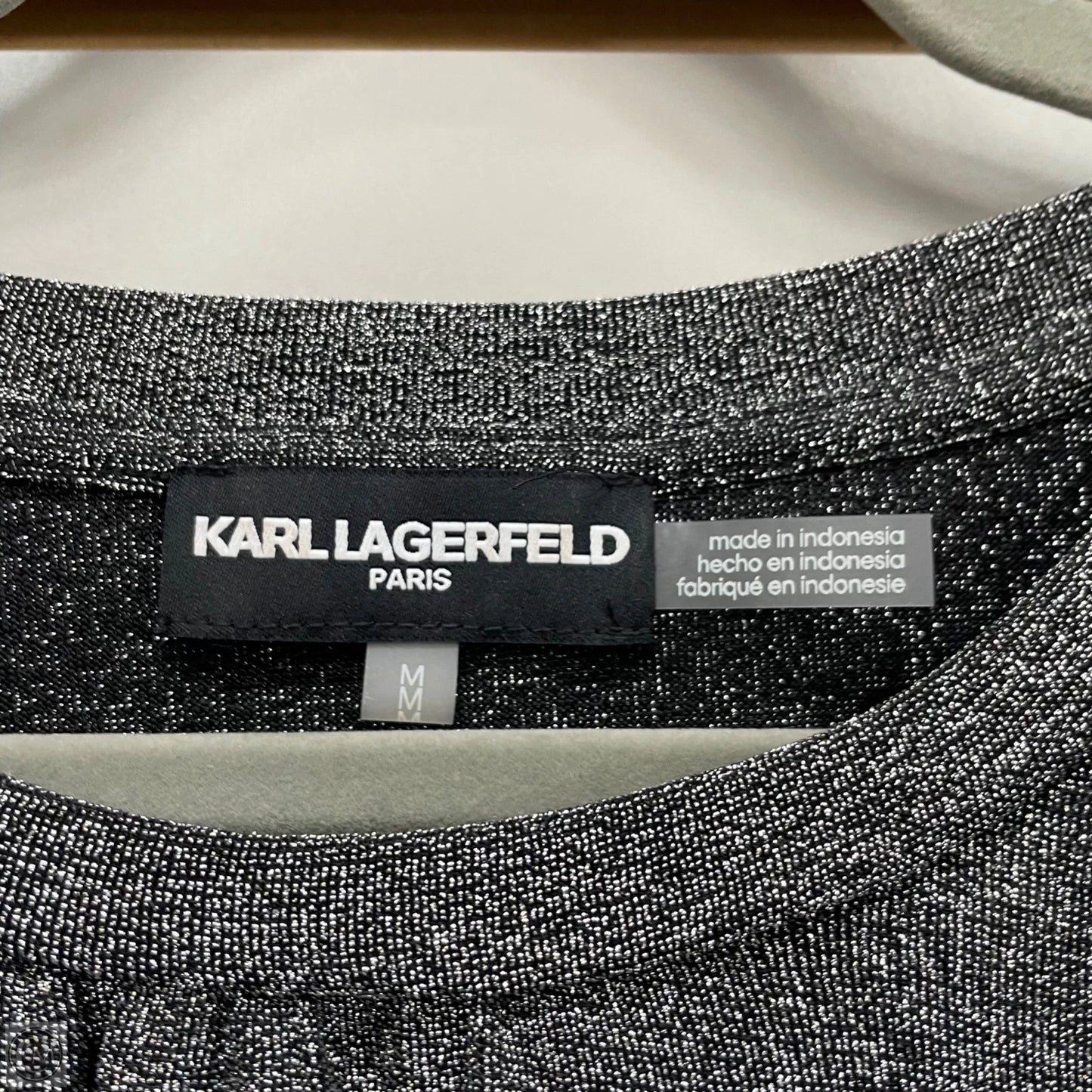 Top Long Sleeve Designer By Karl Lagerfeld In Black & Silver, Size: M